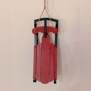 Red and Black Wooden Sled